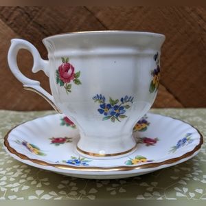 Crown Staffordshire Pansey Flowers Teacup and Saucer Gold plated.